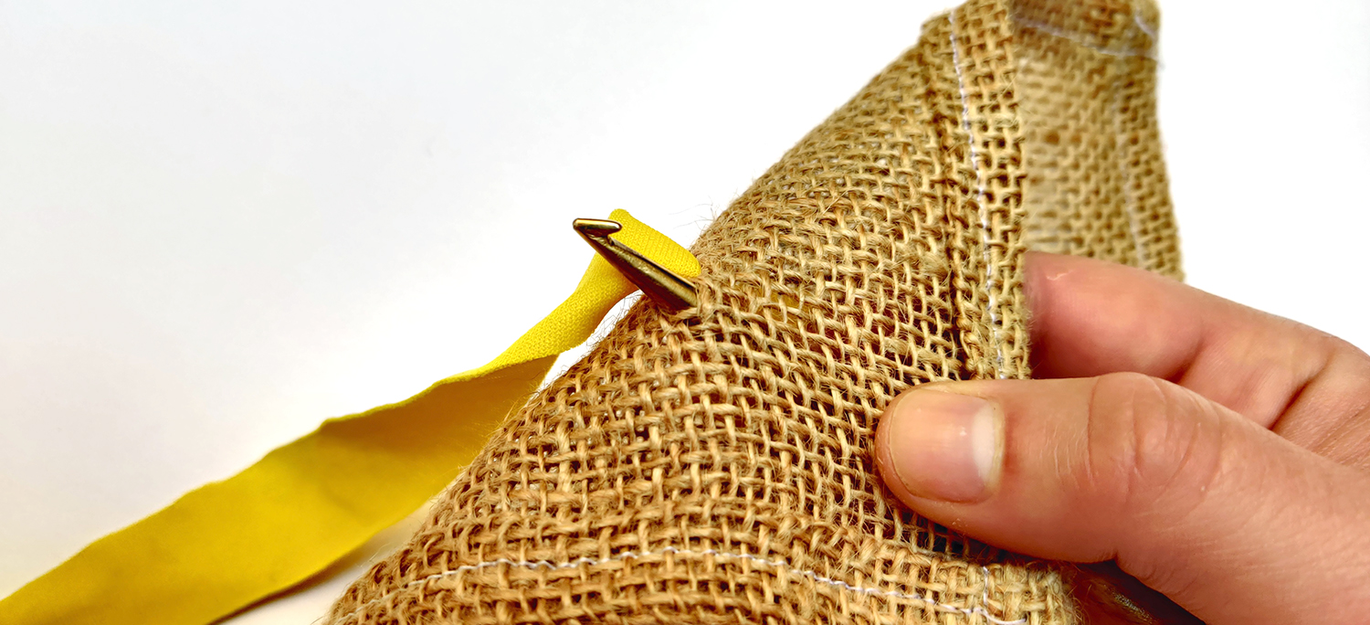Showing Underside of Hessian Ragged Life Rug Hook Demonstration