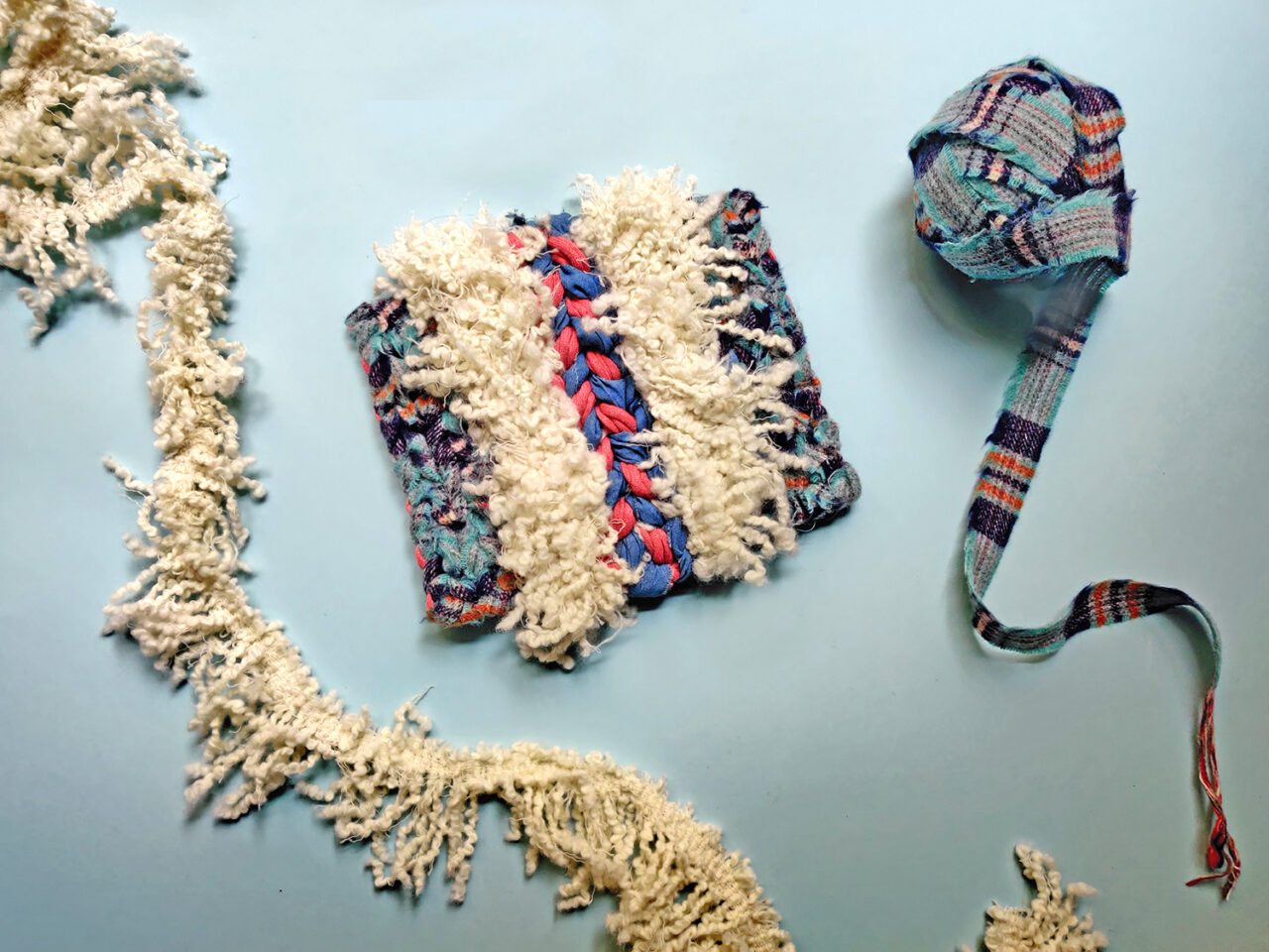 Handmade woollen twined rug made using selvedges