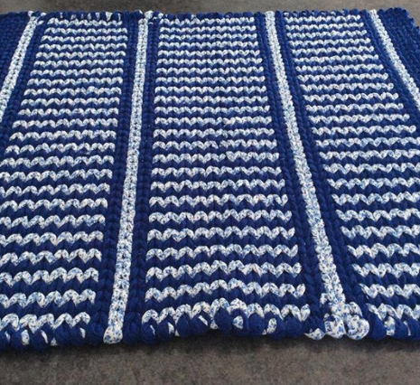 blue and white patterned twined rag rug