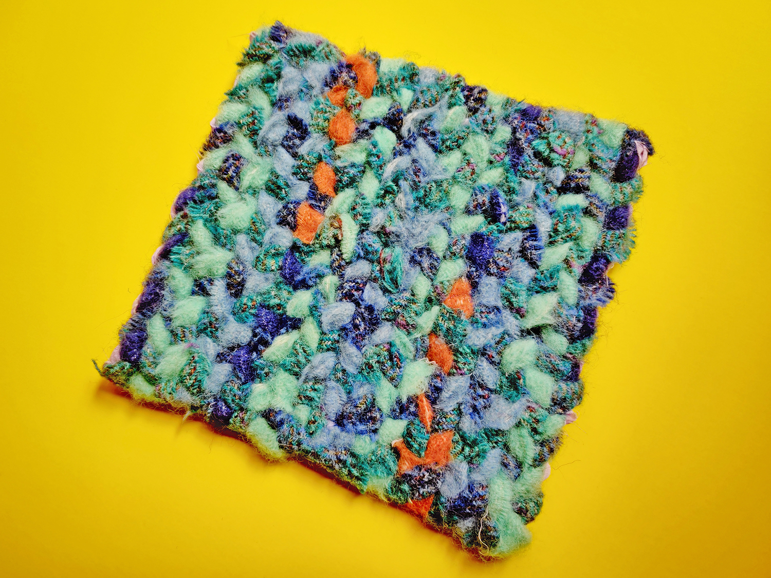 A twining sample made in a rug twining workshop