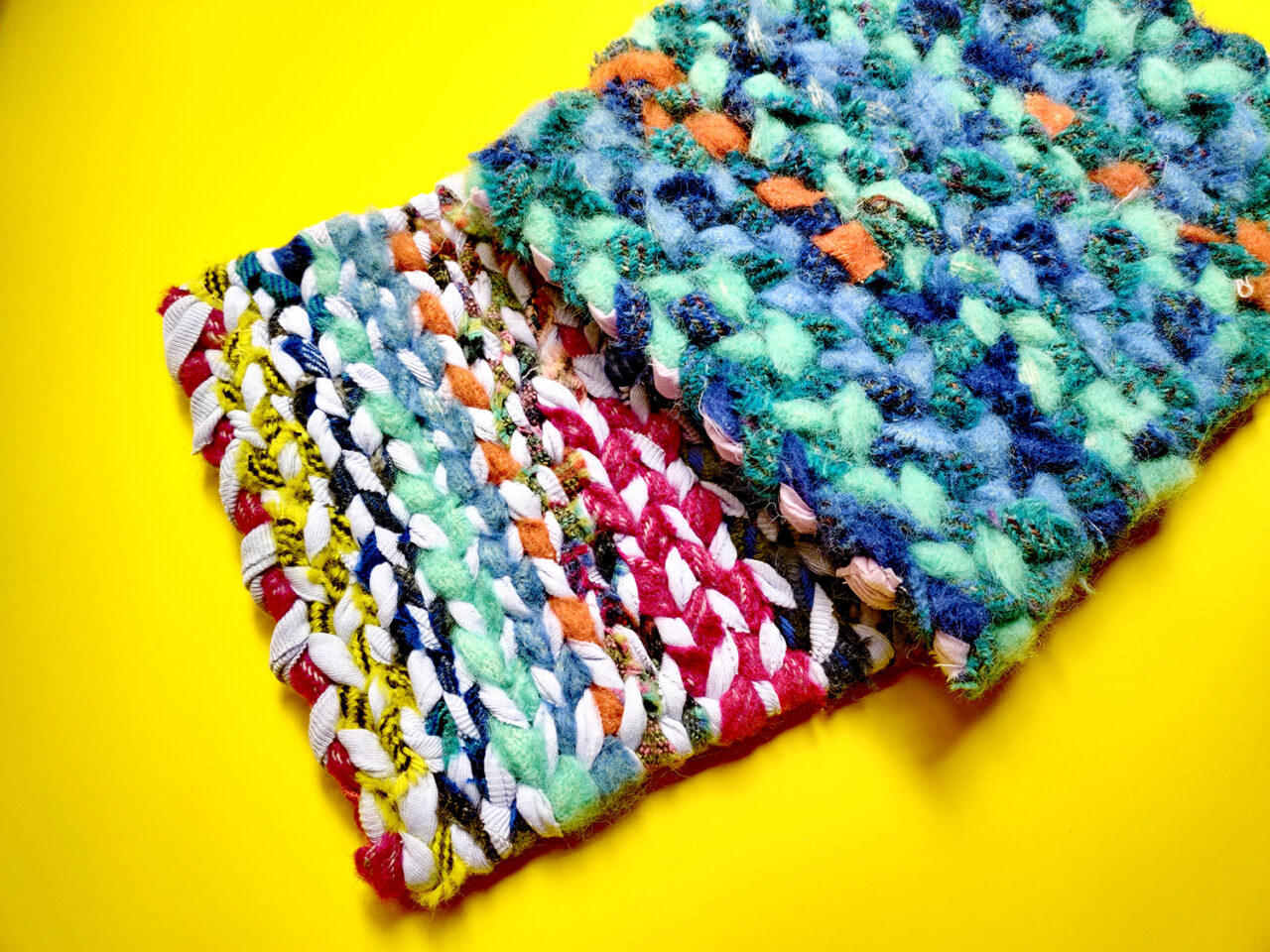 Colourful twined rug samplers made using mixed materials on a twining loom in the UK