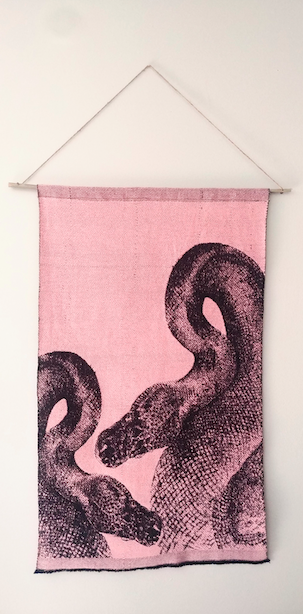 wall hanging with black snake