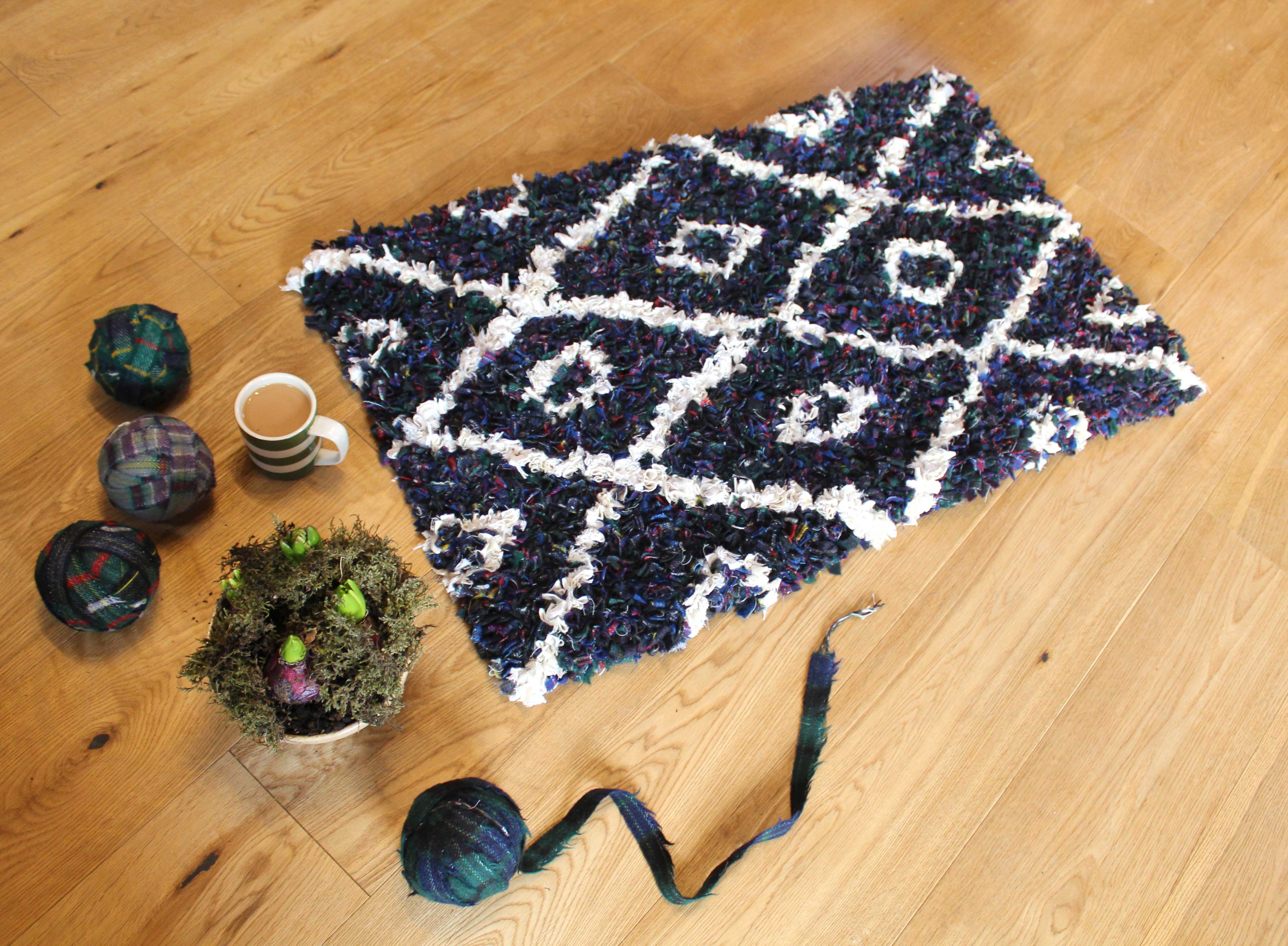 balls of blanket yarn used to make tartan based shaggy rag rug
