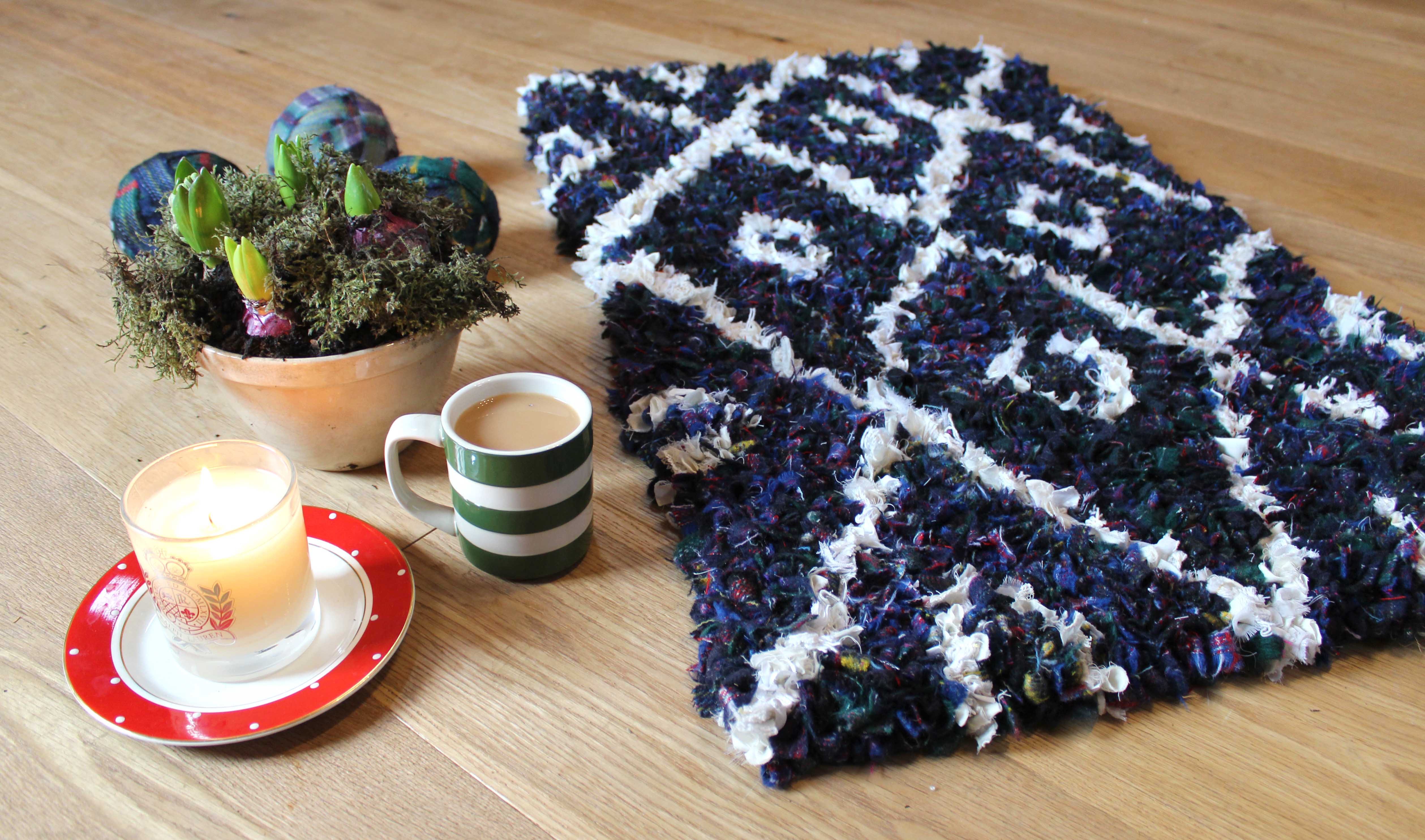 balls of blanket yarn cup of tea shaggy rag rug