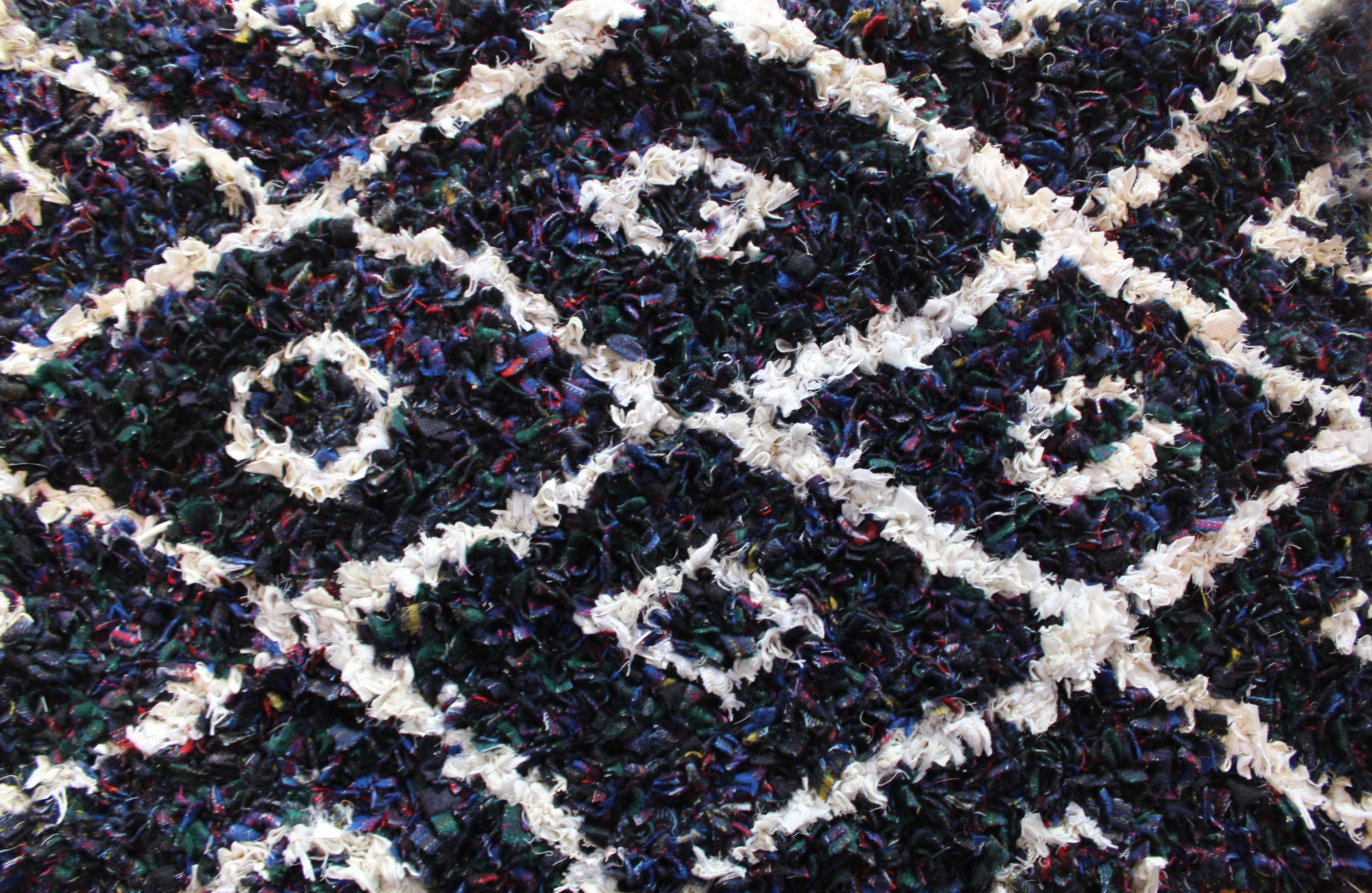 close up rug design using tartan blanket yarn